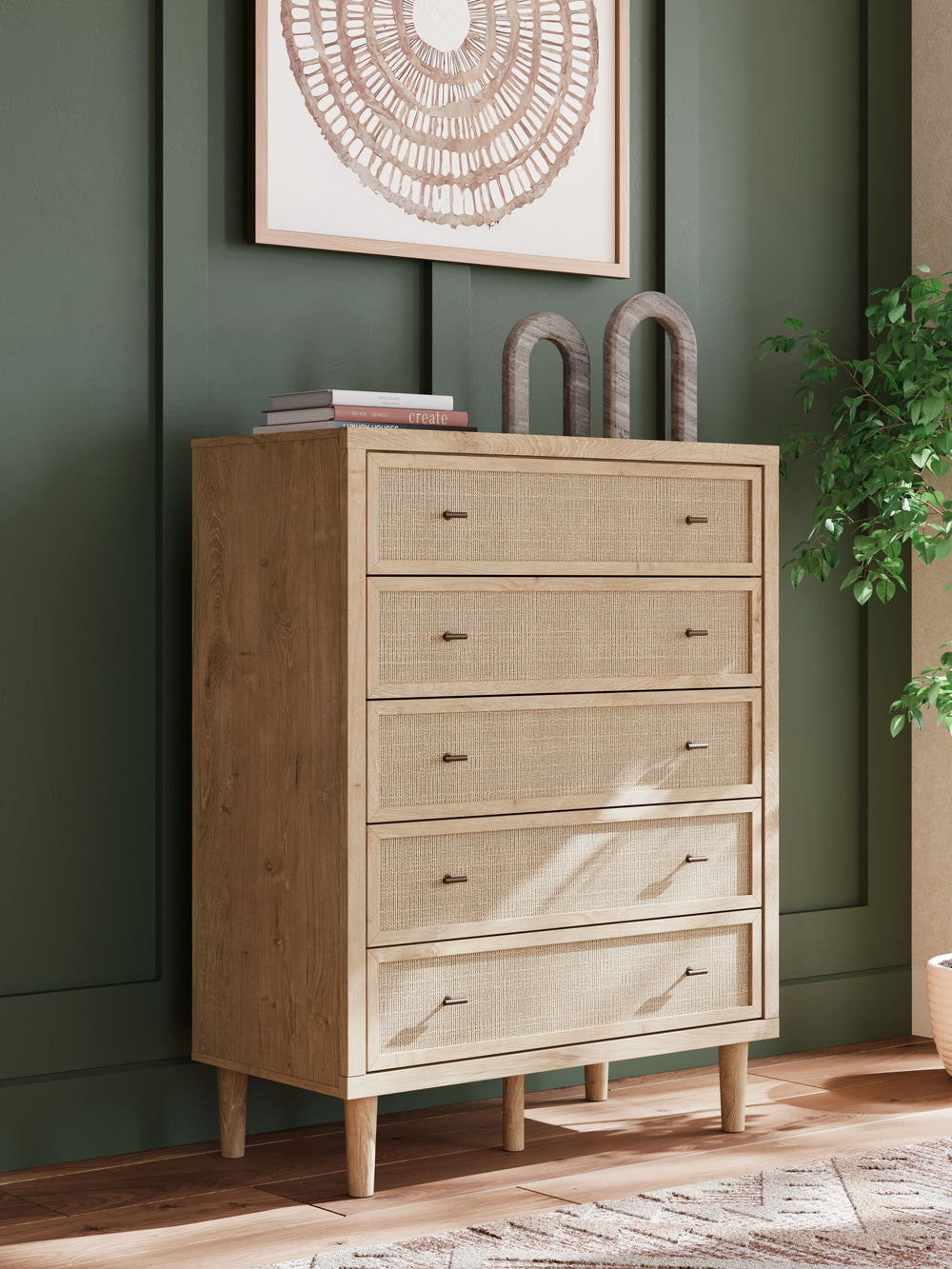 Clean-lined and contemporaryâ€”but far from starkâ€”this chest of drawers is a fresh style awakening. Pairing a light finish with replicated oak grain and textured beige details that replicate the look of cane, its mixed materials bring a naturally versat