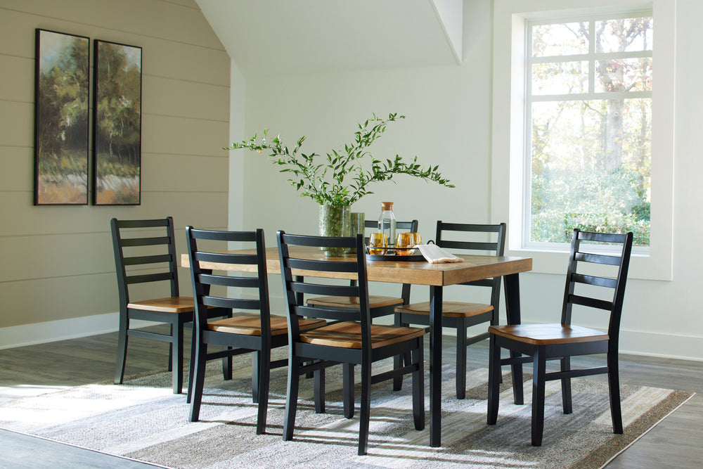 Transform your dining area into a delightful rustic retreat with this seven-piece table set. A two-tone finish adds a layer of charm, creating a visually appealing look that catches the eye. The tabletop-'s inlay chevron pattern adds a unique and stylish 