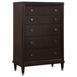 Gleaming knobs and foot caps add contrast and character to a modern five-drawer chest. Its deep brown finish is sleek and refined, perfect for a stylish bedroom with sophisticated presence. Its five drawers offer abundant storage. The top drawer includes 