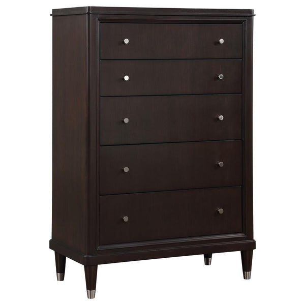 Gleaming knobs and foot caps add contrast and character to a modern five-drawer chest. Its deep brown finish is sleek and refined, perfect for a stylish bedroom with sophisticated presence. Its five drawers offer abundant storage. The top drawer includes 