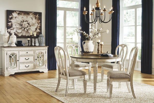 Traditional cottage design. Antiqued two-tone finish featuring chipped white with distressed wood finished tops. Tops feature Oak veneers, while the cases are made with birch veneers and hardwood solids. Framed drawer fronts and decorative fret laid over 