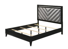 Sleep in style with this modern Chelsie bedroom collection. The sturdy bed is a focal point on its own with its gray channel-tufted headboard and tapered legs. Add depth and reflect light with its silver trim that is featured throughout the bed and case g