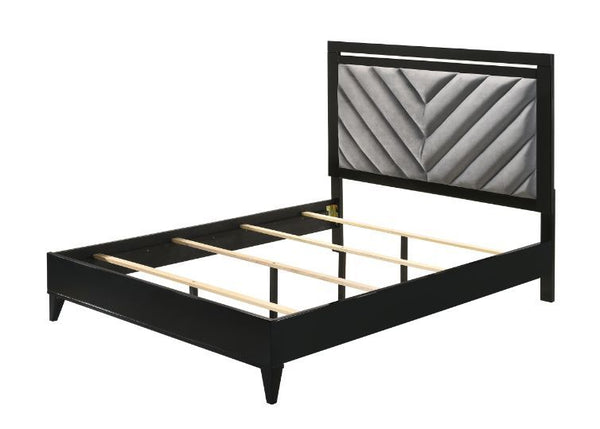 Sleep in style with this modern Chelsie bedroom collection. The sturdy bed is a focal point on its own with its gray channel-tufted headboard and tapered legs. Add depth and reflect light with its silver trim that is featured throughout the bed and case g