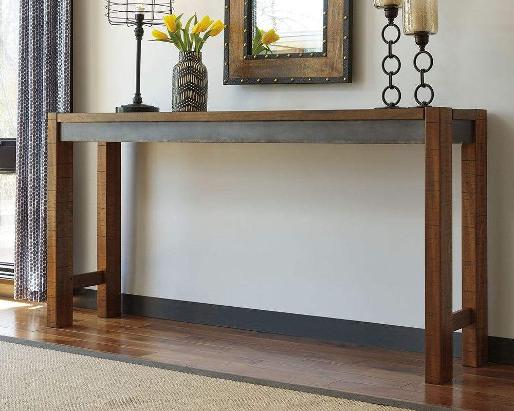 Make your home the hub for cool vibes with this long counter table. Two-tone finish scheme of distressed warm brown and aged gunmetal is full of urban industrial swagger. Long length makes it suitable for 3 people to sit. Add it behind your sofa with stoo