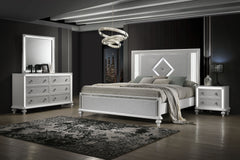 Transform your bedroom into a sanctuary of elegance with the Stardust 4 Piece Bedroom Suite in gleaming white. The set includes a Bed, Dresser, Mirror and Nightstand. Crafted to stand the test of time, each piece is meticulously constructed from manufactu