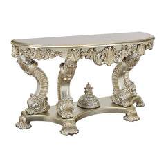 Traditional style that never goes out of fashion, the Sorina coffee table is a great addition to your living room. The silver and gold finishes complement each other flawlessly. This coffee table showcases elaborate carvings on the table base to recreate 