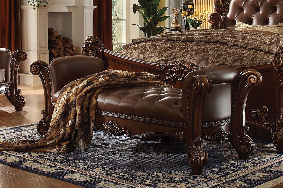 Create an elegant, traditional design in your room with the Vendome Bench. A hand-crafted piece inspired from the luxurious designs of the past, the beautiful cherry finished bench features a PU cherry button-tufted seat with Nailhead trim and elaborately