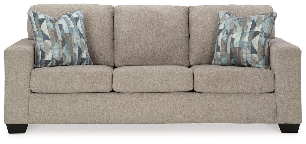 Youâ€™re in for a neat treat with this sofa. Its comfy seats are covered in soft, textural upholstery, and the wide track arms are eager to support your quest for total relaxation. Distressed abstract toss pillows bring a fresh breath of contemporary styl