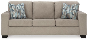 Youâ€™re in for a neat treat with this sofa. Its comfy seats are covered in soft, textural upholstery, and the wide track arms are eager to support your quest for total relaxation. Distressed abstract toss pillows bring a fresh breath of contemporary styl