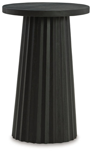 Show off your trend-right sensibilities with this contemporary accent table. Designed for the modern tastemaker, the solid wood piece wows with a fluted base. This organic beauty can be used on its own or grouped with other pieces in the collection. Howâ€