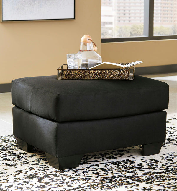  turn to this designer chair and ottoman. Wind down at the end of a long day when you sink into this canyon of comfort. <h4><b>Darcy - Black - Chair</b></h4> <table width=-"100%-"><colgroup><col style=-"width: 30%