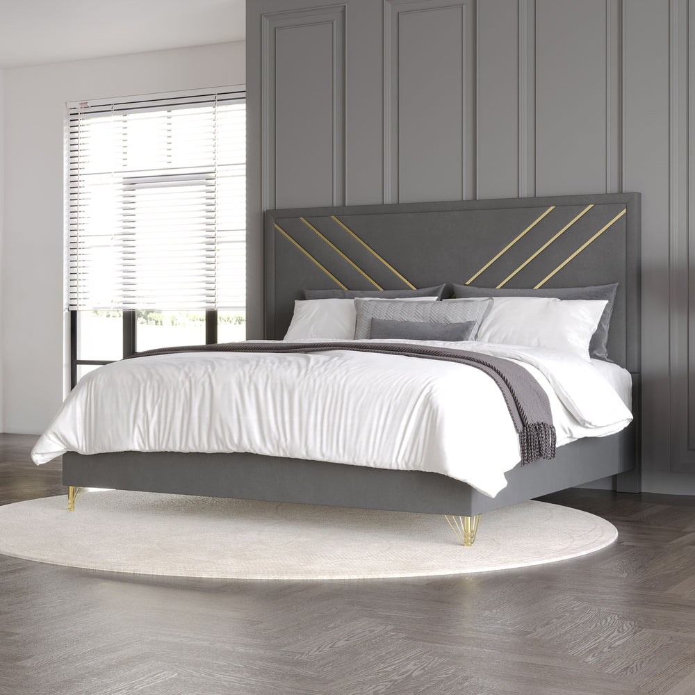 Experience luxury with the Symmetry Upholstered Panel Bed in Gray. Crafted from premium woods with a gray marble laminate, it radiates timeless elegance. Gold metal and mylar accents shine against ultra-soft gray fabric, while intricate detailing adds sop