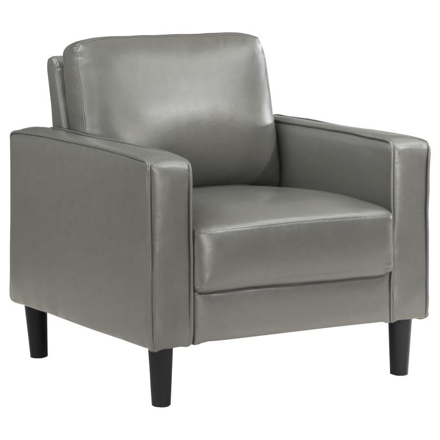 From your stylish home to a professional setting, this modern armchair is a chic choice. It features a structured silhouette with a compact footprint and straight track arms. Faux leather upholstery is smooth and sleek, offering a refined touch that can b
