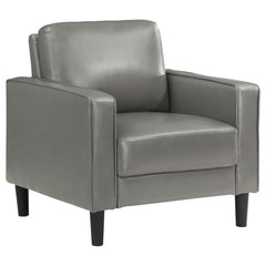 From your stylish home to a professional setting, this modern armchair is a chic choice. It features a structured silhouette with a compact footprint and straight track arms. Faux leather upholstery is smooth and sleek, offering a refined touch that can b