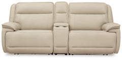 This power reclining sectional loveseat is the perfect combination of sleek style and thoughtful functionality. Engineered for comfort and convenience, it offers concealed storage compartments and endless relaxation. From movie nights to family gatherings