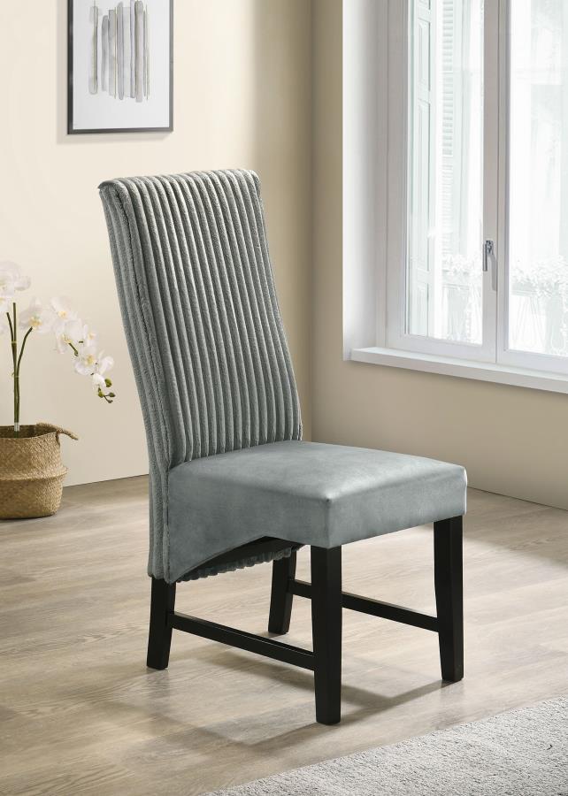 Elevate your dining space with these sophisticated dining chairs, blending textures and luxurious fabrics for a modern, elegant look. The seat back features wide channel corduroy upholstery, adding rich texture and a stylish visual contrast. The seat itse