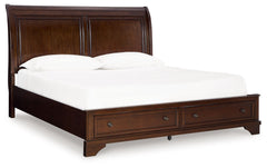 This queen sleigh storage bed has a timeless look and traditional design that dresses up your bedroom. Its warm brown cherry finish adds a casual classic aesthetic, with the double-framed panels on the sleigh headboard complemented by a chic storage footb