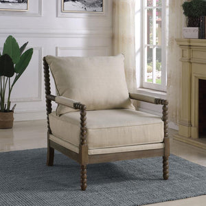  this accent arm chair makes a statement. Warm beige upholstery adds texture to the seat