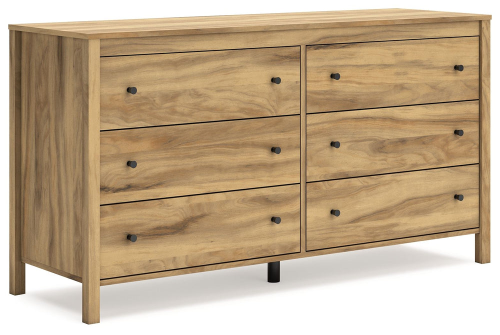 This dresser puts the dream of a casual bedroom retreat beautifully within reach. A warm light brown finish over replicated hickory grain exudes a homey vibe. The smooth-gliding drawers are packed with storage possibilities. Itâ€™s a simply relaxed way to