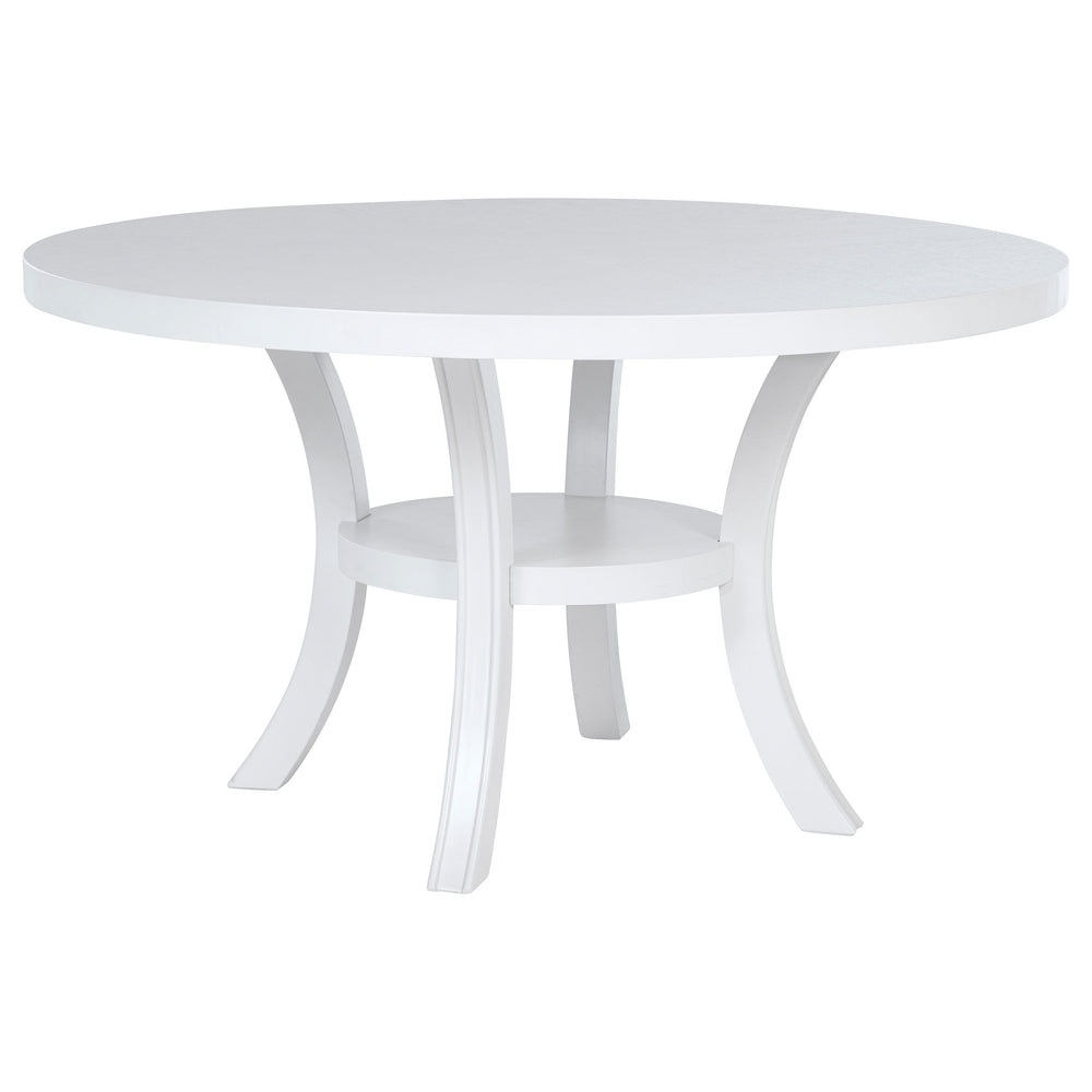 Freshen up your breakfast nook with the clean, modern presentation of a round dining table. It-'s a simple, engaging look that features a roomy round tabletop and a cool white finish. The table boasts a square edge and stands on flared legs unified with a