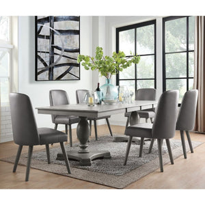 Keep everyone comfortable with the contemporary yet casual Waylon dining group. This beautiful round table features a wood top and turned pedestal base in a warm gray oak finish. Allowing seating for four people, this wonderful set is ideal for your kitch
