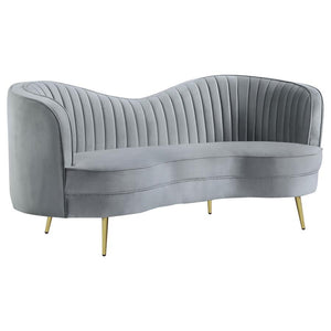 Transform a conventional space into a parlor-inspired retro room with this chic sculptural loveseat. Alluring curves infuse romance into a kidney-shaped loveseat created to become a focal point. This loveseat is fully encased in solid wood and covered in 