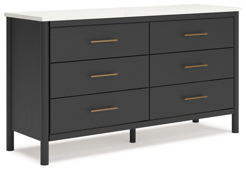 This dresser reflects your sophisticated approach to boho style. Crafted with both form and function in mind, its replicated marble top beautifully contrasts a matte black finish. The versatile design suits all-neutral spaces or blends with your favorite 