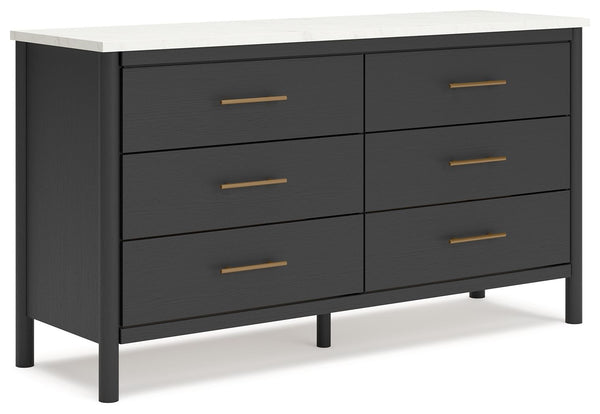 This dresser reflects your sophisticated approach to boho style. Crafted with both form and function in mind, its replicated marble top beautifully contrasts a matte black finish. The versatile design suits all-neutral spaces or blends with your favorite 