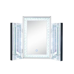 Display your dazzling sense of style by topping your vanity with the Nysa tri-fold mirror. This trifold mirror features a beveled mirrored frame with faux crystal inlay and LED lighting. Each piece is hinged, allowing you to adjust the position of the sid