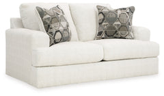 Craving casual refinement? This loveseat has you covered. Its decidedly contemporary frame cradles sizable cushions in an ultra-soft neutral hue, lightening the mood in your living room with simple style and everyday comfort. Solid and geometric accent pi