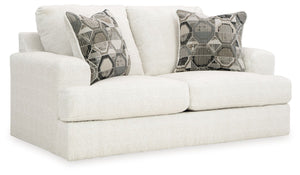 Craving casual refinement? This loveseat has you covered. Its decidedly contemporary frame cradles sizable cushions in an ultra-soft neutral hue, lightening the mood in your living room with simple style and everyday comfort. Solid and geometric accent pi