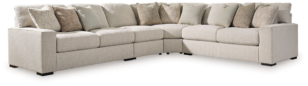 Reminiscent of a fine, subtly patterned herringbone jacket, this casually elegant sectional offers contemporary style in spades. A distinctive curved shape provides plenty of leg room, while soft feather-blend cushions maximize relaxation. Why skimp on co