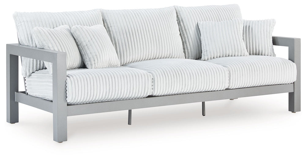 Indulge in luxe outside living without sacrificing longevity. This outdoor sofa combines on-trend texture with a sleek aluminum frame. Lounge poolside or on the porchâ€”the comfy cushions are a chic spot for you and a partner or two to soak up the sun. An