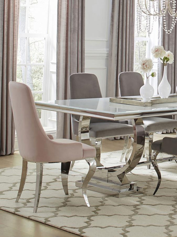  it features a graceful slipper-style silhouette with a high back and demi arms for added elegance. The sculptural cabriole legs
