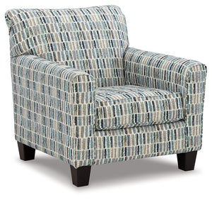 This accent chair has the corner on casual contemporary style and everyday comfort. Chic and subtly innovative, its colorful geometric upholstery is a forward-thinking take on cool hues. This simple, streamlined design is sure to appeal to your relaxed ap