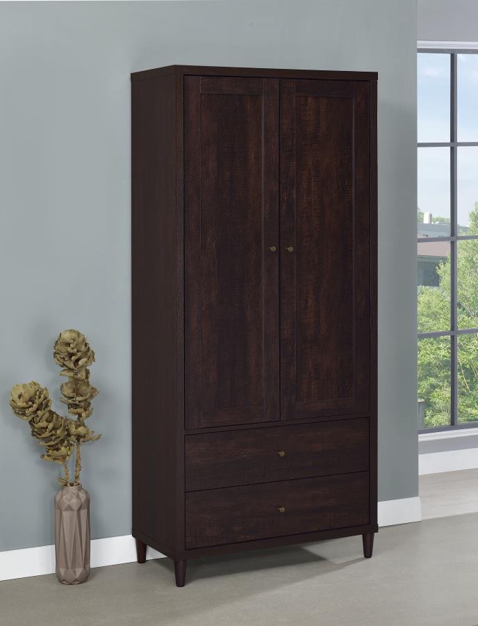 This impressive accent cabinet imparts an imposing presence to the home. At over six feet tall, it has the capacity to take on all storage needs. Two doors open up to ample space. Below are two deep drawers for additional storage of everything from sofa c