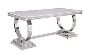 Get your dining guests instantly intrigued by the eye-catching and modern design. Open circle-accented trestle base made of shiny stainless steel is topped with beautiful cultured marble. It-'s metal frame showcases uncluttered lines and simplicity of thi