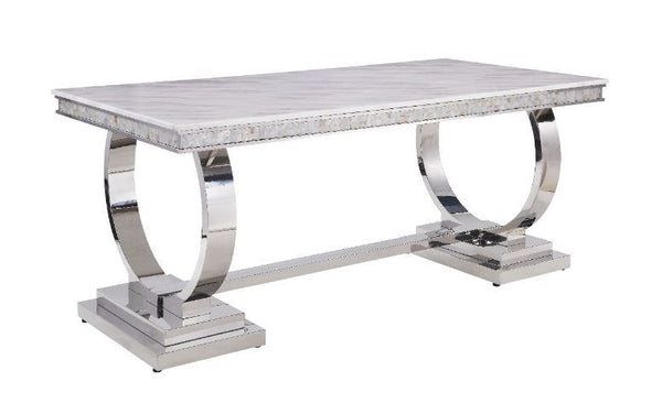 Get your dining guests instantly intrigued by the eye-catching and modern design. Open circle-accented trestle base made of shiny stainless steel is topped with beautiful cultured marble. It-'s metal frame showcases uncluttered lines and simplicity of thi
