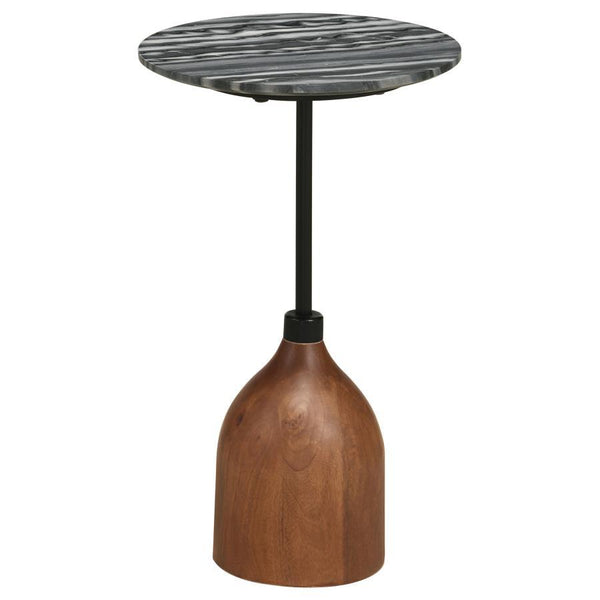 A compact profile makes maximum impact with impeccable design and luxurious materials. A contemporary side table is perfect for drinks, complete with a round top that acquits itself wonderfully in your living room. The top is made from beautiful black mar