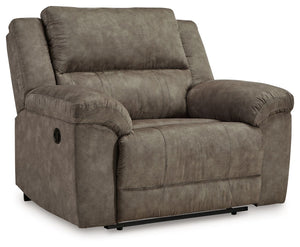Is being too comfortable even possible? Itâ€™s worth finding out in this oversized recliner. Wrapped in the plushest of neutral faux leather upholstery, it-'s perfectly cushioned in all the right places. We love the recliner-'s super wide seating with ple