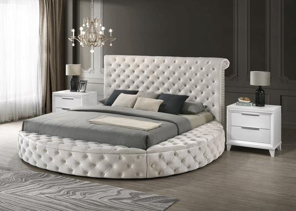 This avant-garde bed is a luxurious retreat, blending opulence with innovative design. Its unique round form challenges traditional bedroom aesthetics, offering a lavish centerpiece that is as comfortable as it is striking. The bed is generously upholster
