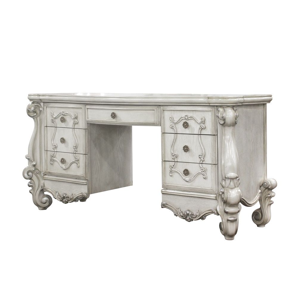 The Versailles vanity desk is the perfect accent to create the style of royalty your bedroom has been needing. This vanity desk crafted in wood with bone white finish was inspired by old European design with brown copper metal hardware and intricate wood 