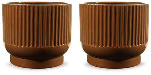 This ceramic vase makes a relaxed style statement. Its casual design and earthy burnt umber glaze complement your laid-back sensibilities. Delightfully simple and simply delightful, this vase subtly wows on its own or when filled with your favorite flower