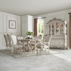 decorated with raised and scrolled floral motifs in an antique champagne finish. This stylish a