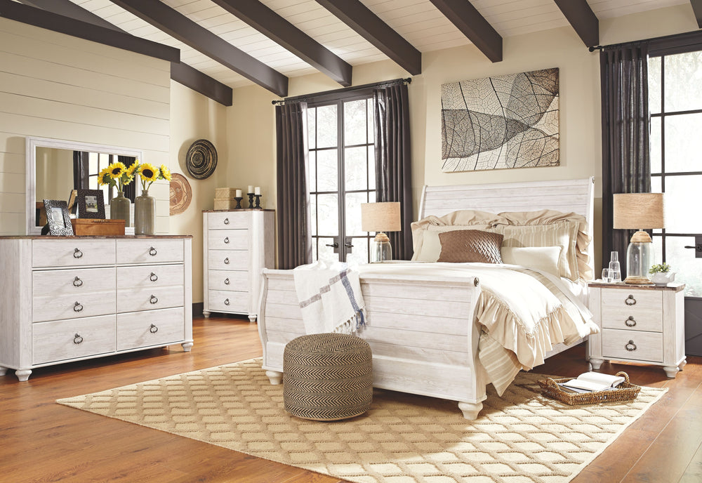 Two-tone finish in white wash replicated worn through paint with authentic touch and a replicated wood grained block pattern with authentic touch. Large scaled shapely bedroom collection features bun feet. Ring pull hardware in an antique brass color, acc
