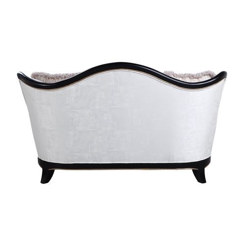  and tight cushioning. This formal Nurmive collection adds a sense of provincial elegance in neutral beige upholstery. The backrests are enhanced wi
