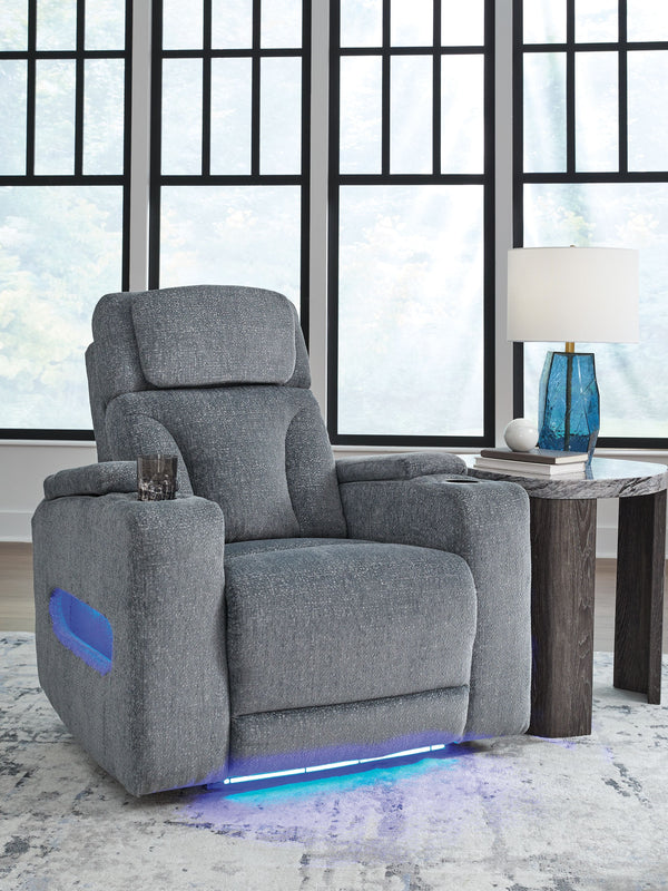  while the extended ottoman takes your comfort to the next level. Handy charging features and storage cu