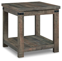 Keep your aesthetic chic and approachable with this charming end table. The piece has an effortless beauty, with a replicated aged barn wood pattern and matte black metal accents adding vintage-inspired elegance. Combining elements of fashion and function
