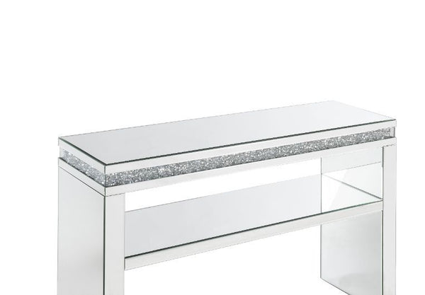  this Noralie Sofa Table is meant to become your favorite focus in your living room. Mirrored accents with faux diamonds inlay achieve a modern glamour look. This piece makes a glam style statement that offers a sat