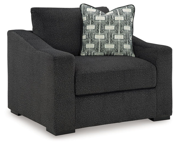 Your downtime should be super-cozyâ€”and super-chic. This oversized chair encourages stylish indulgence as you lounge. Plush, chunky upholstery adds a relaxed yet eclectic twist to the transitional look. With this exquisitely comfortable and fashion-forwa